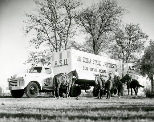 Horses and Riders Standing by an Arizona State University Sun Devil Rodeo Truck