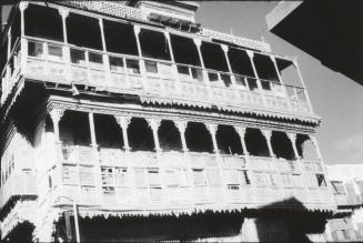 Multi-Columned Balconies on the Façade of an Old Building