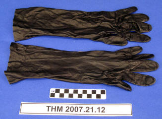 Black leather long gloves.
