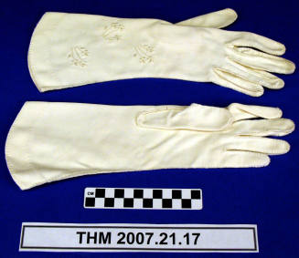 Embroidered evening gloves.