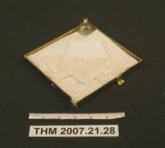 Lace-edged white handkerchief