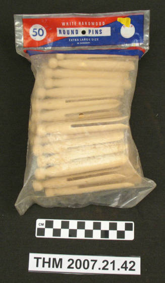 Large, round wooden clothespins in bag (50).