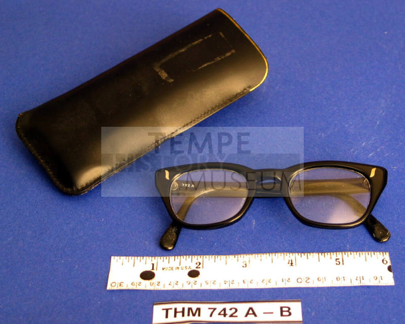 Black rimmed eyeglasses with case