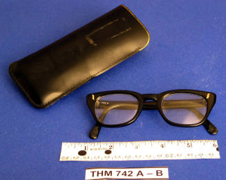 Black rimmed eyeglasses with case