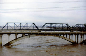 Photographic Slide - Flood Waters Under Ash Avenue and Railroad Bridges