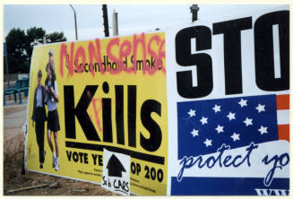 Defaced Proposition 200 Sign and Anti-Proposition 200 Sign.