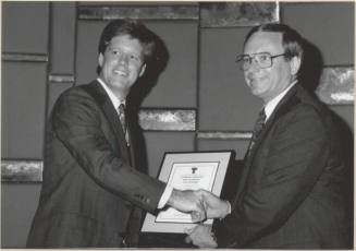 Photo of Harry Mitchell and Joseph Lewis with Certificate of Election, 1992.