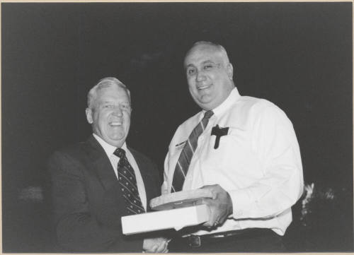 Photo of Vice Mayor Ben Arredondo Presenting Plaque to Outgoing Commission Member, 1999.