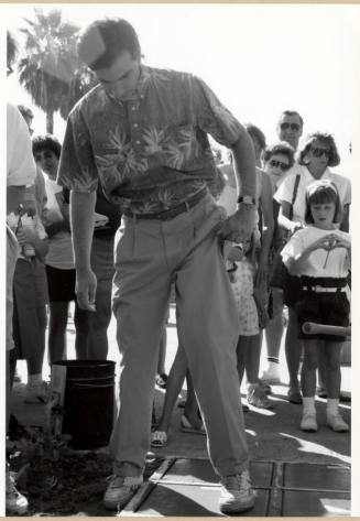 Councilman Neil Giuliano Making a Cement Footprint During the Grand Opening of the Tempe Historical Museum, Oct. 1991.