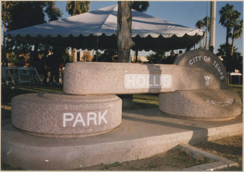 Color photograph of Hollis Park sign and recption tent for renaming of park.