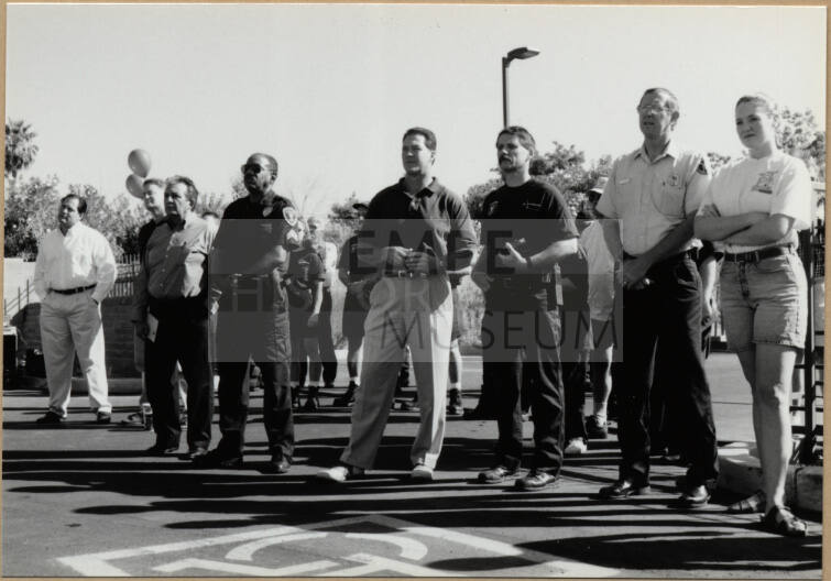 Black and white photograph of Rich Woerth and others at the dedication of Apache Blvd. Fire Station