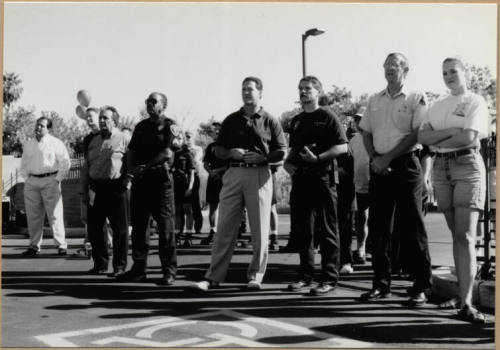 Black and white photograph of Rich Woerth and others at the dedication of Apache Blvd. Fire Station