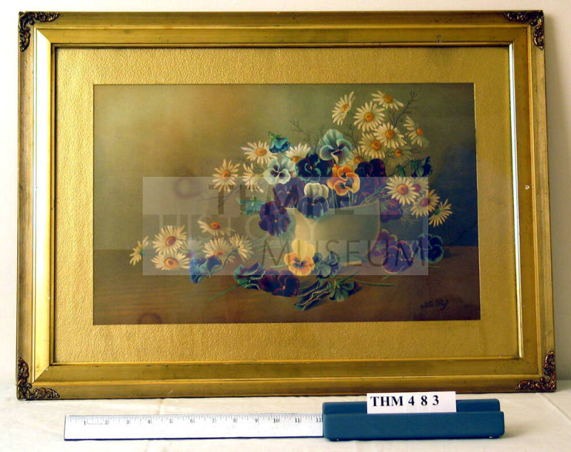 Framed watercolor painting of pansies and daisies
