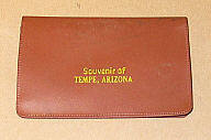 Wallet, Brown vinyl, stamped "souvenir of Tempe, AZ".  Has paper pad, Tom King ID card