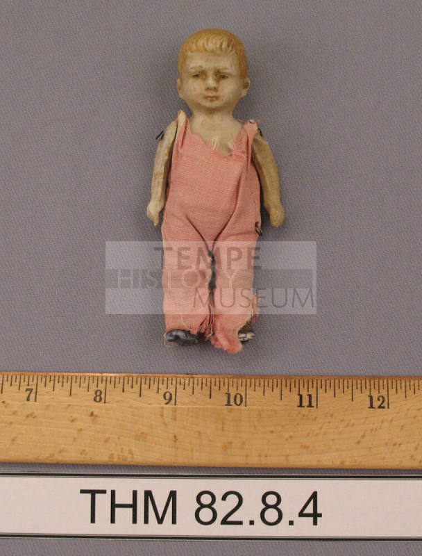 Boy doll with pink cotton jump suit