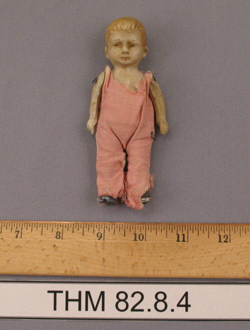 Boy doll with pink cotton jump suit