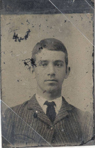 Portrait of Man in Striped Coat