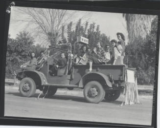 Women in Parade Truck
