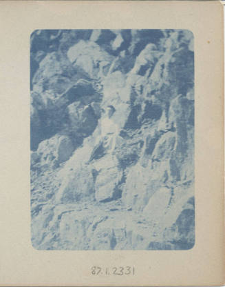 Unidentified Woman Standing on a Rock