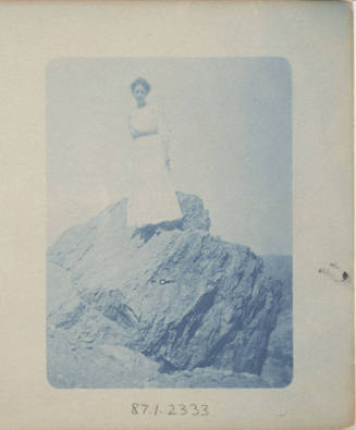 Unidentified Woman Standing on a Rock