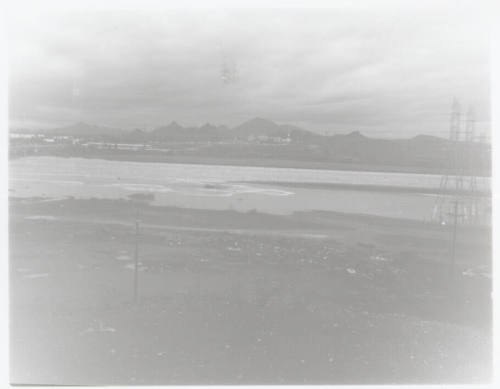 flooded Salt River with power line towers