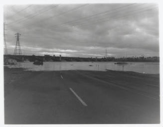 A road submerged by the flooded Salt River
