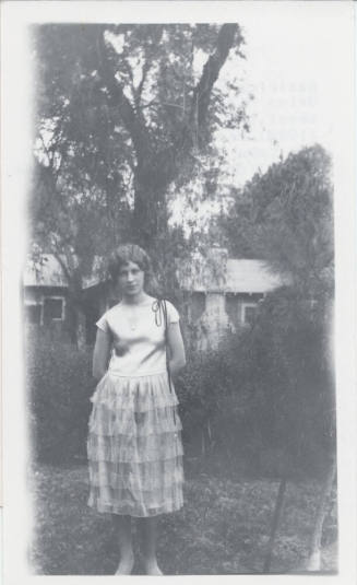 Photograph of Beatrice Felton in a Yard
