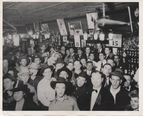 Luther Finley with Saloon Customers
