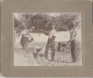 Three Men Using a Forge, Anvil and Tools