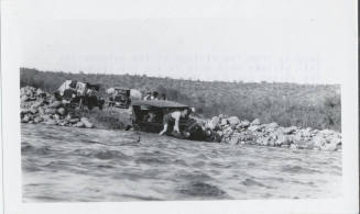 Automobile Stuck in Flooded Wash