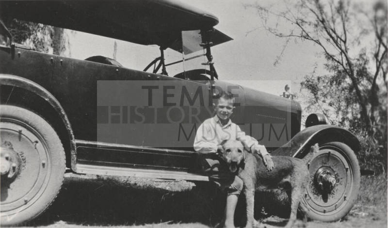 Young John A. Swearengin and Dog by Car