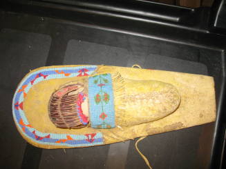 Indian doll in cradle board, Apache
