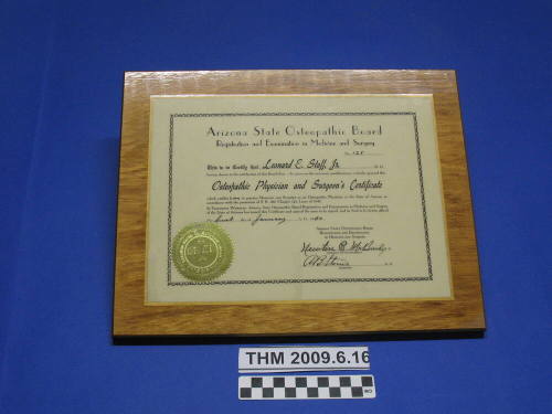 Leonard Staff, Jr.'s Arizona Medical License on wooden plaque