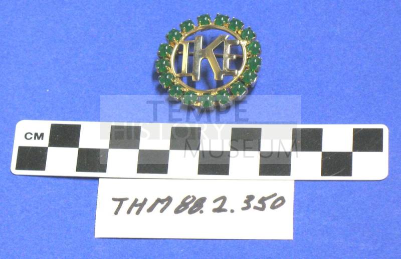 Green "stone" gold circle "Ike" pin
