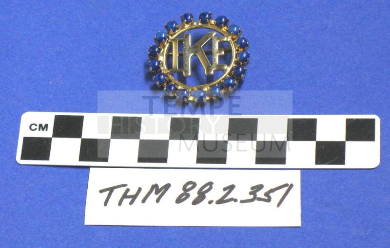 Blue "stone" gold circle "IKE" pin
