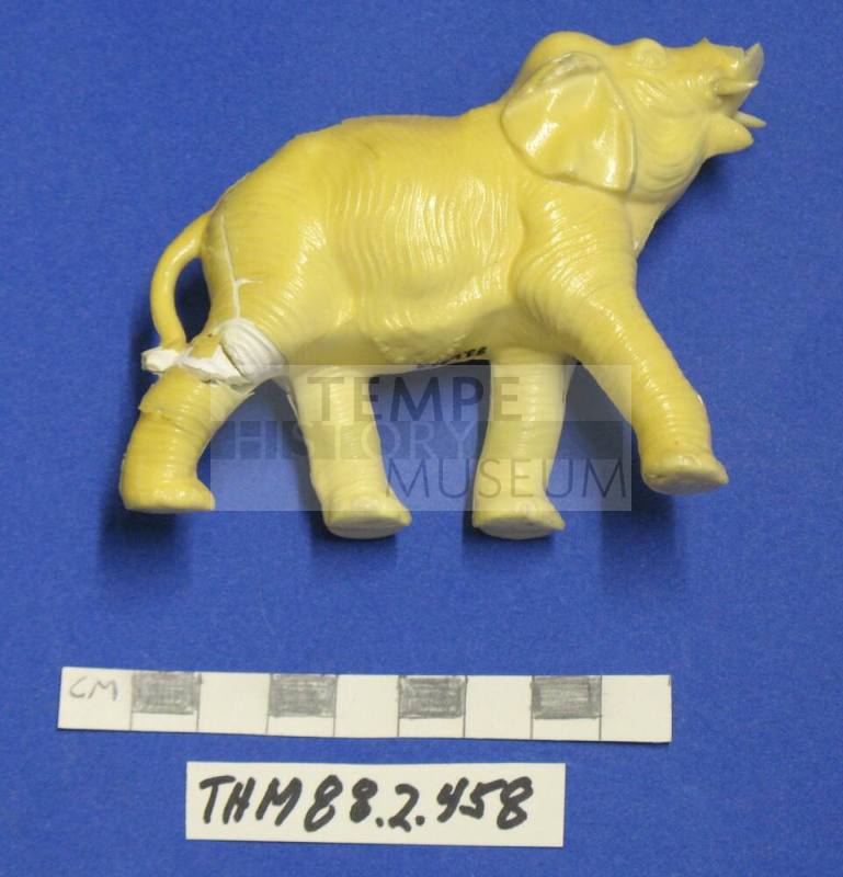 Elephant figurine, plaster with yellow coating