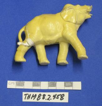 Elephant figurine, plaster with yellow coating