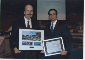 Photograph of the Presentation of Recognition Certificate from Valley Metro Rail to Mayor Giuliano at Formal Tempe Council