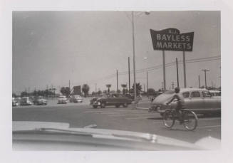 A.J. Bayless Market Parking Lot, 1328 E. Apache