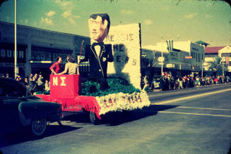 Parade:  Greek Float with huge Tuxedo Figure - Mill Avenue, Tempe