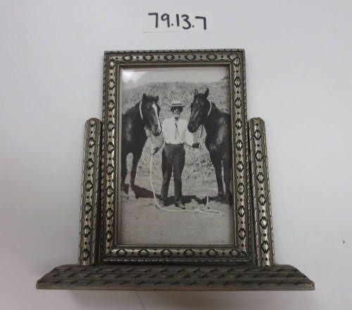 Silver painted, swiveled picture frame