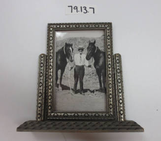 Silver painted, swiveled picture frame