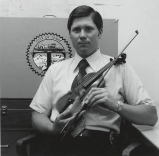 Portrait of Unidentified Tempe Police Officer with Violin