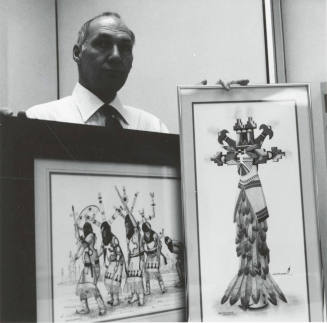 Unidentified Man with Two Native American Paintings