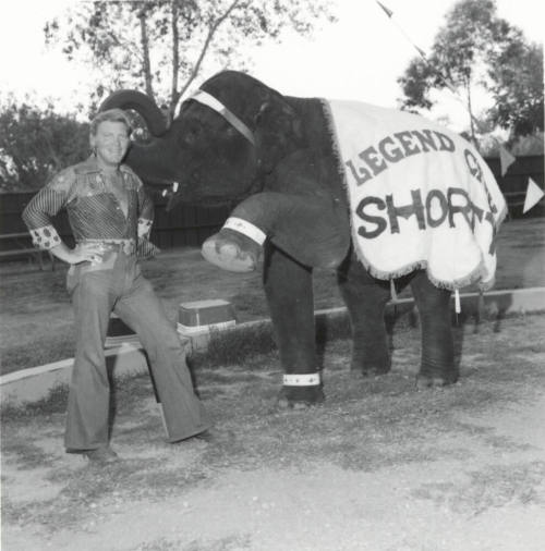 Elephant and trainer at Legend City. - July 1977