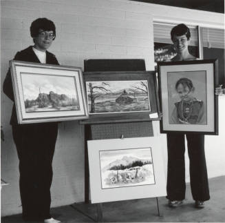 Two Women Posing with Southwestern Artwork -  September 1977