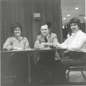 Unidentified Seated Group of 3 People