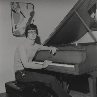 Young man at piano