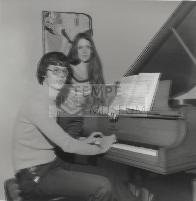 Man And Woman At A Piano; Blurry
