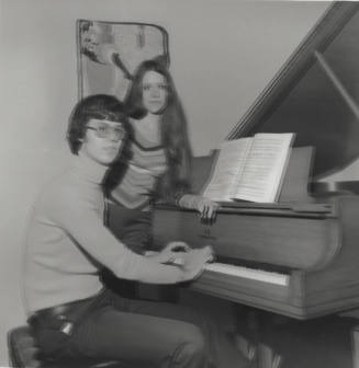 Man And Woman At A Piano; Blurry